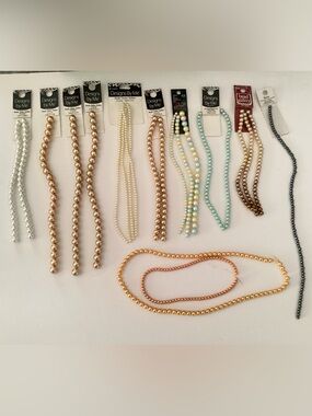 Lot of faux pearl strands of beads